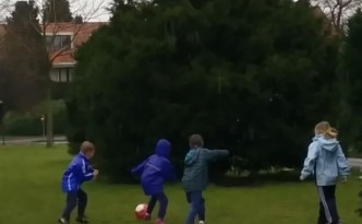 Voetballen in de regen